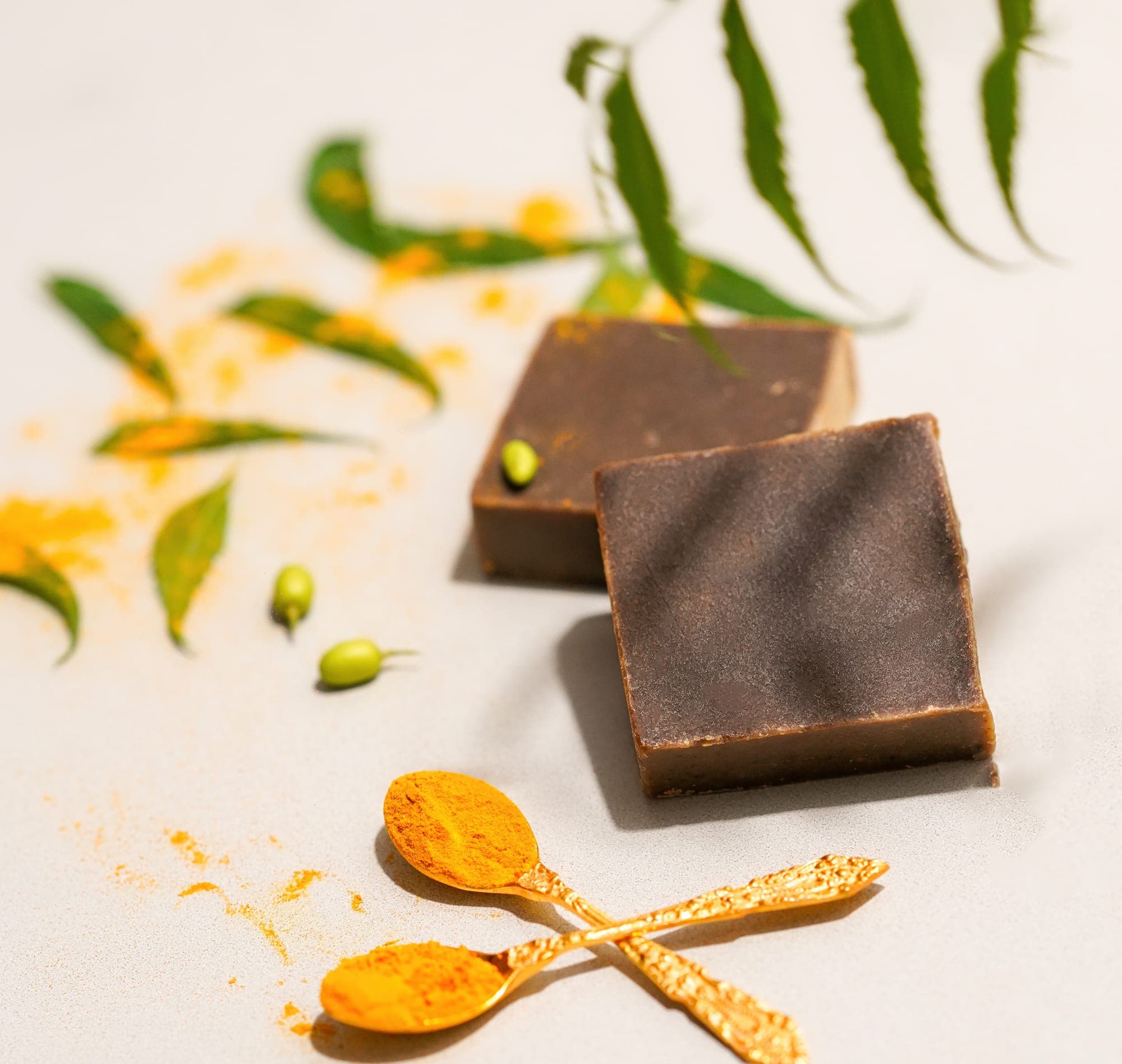 Turmeric and neem soaps with fresh botanicals